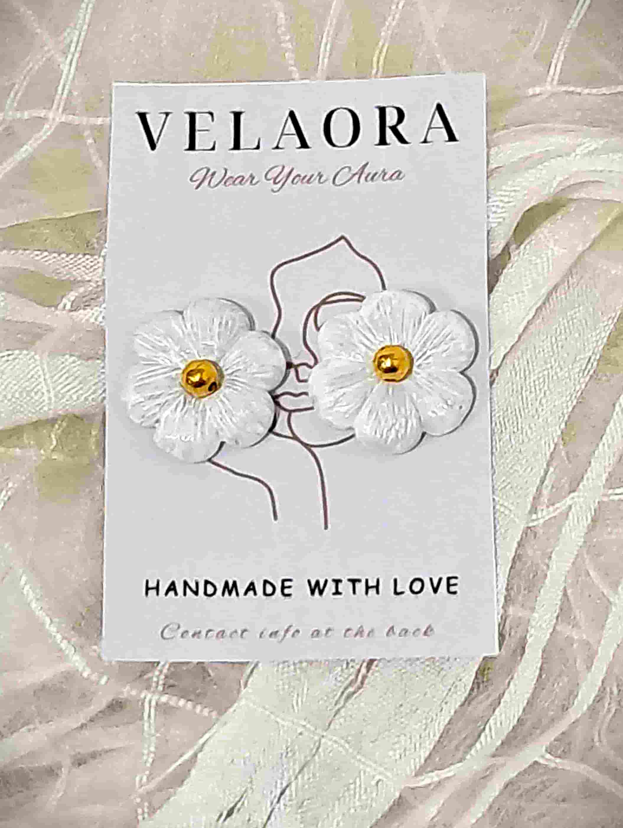 handmade white flower by Velaora Jewels